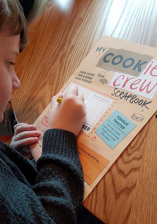 Jacob doing activity book