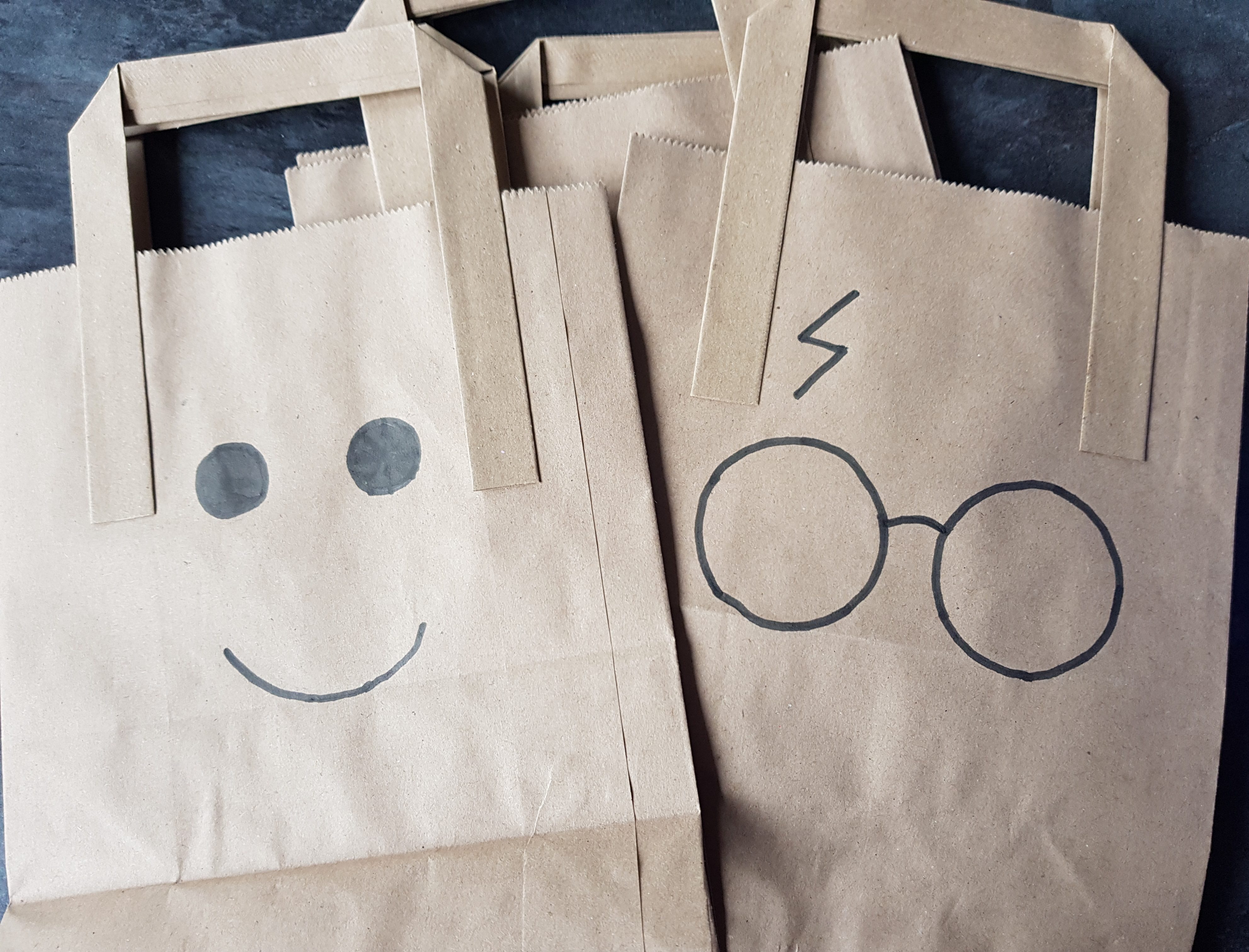 Lego face and Harry Potter glasses and scar party bags