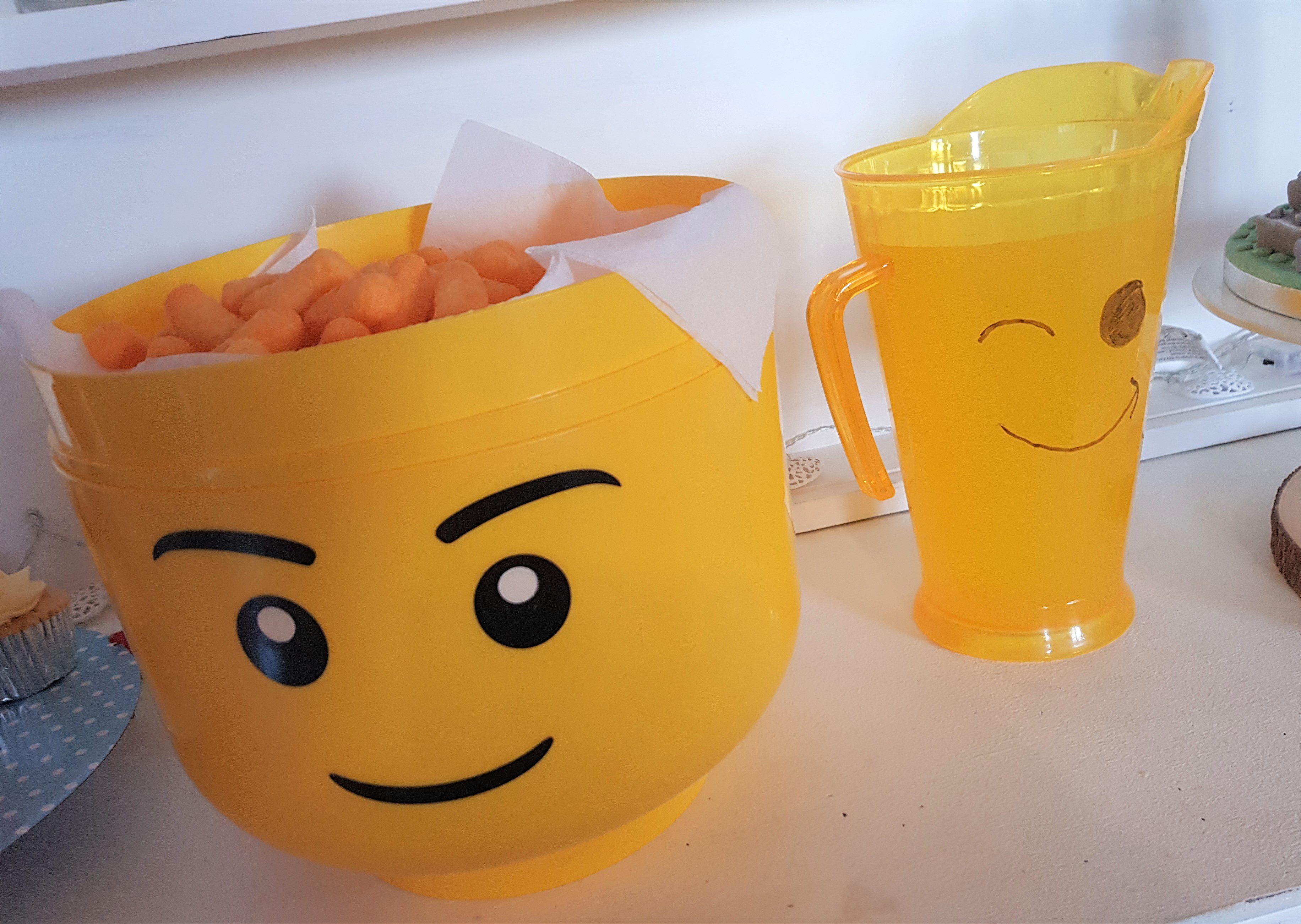 Bertie Lego head, lego face drawn on yellow jug