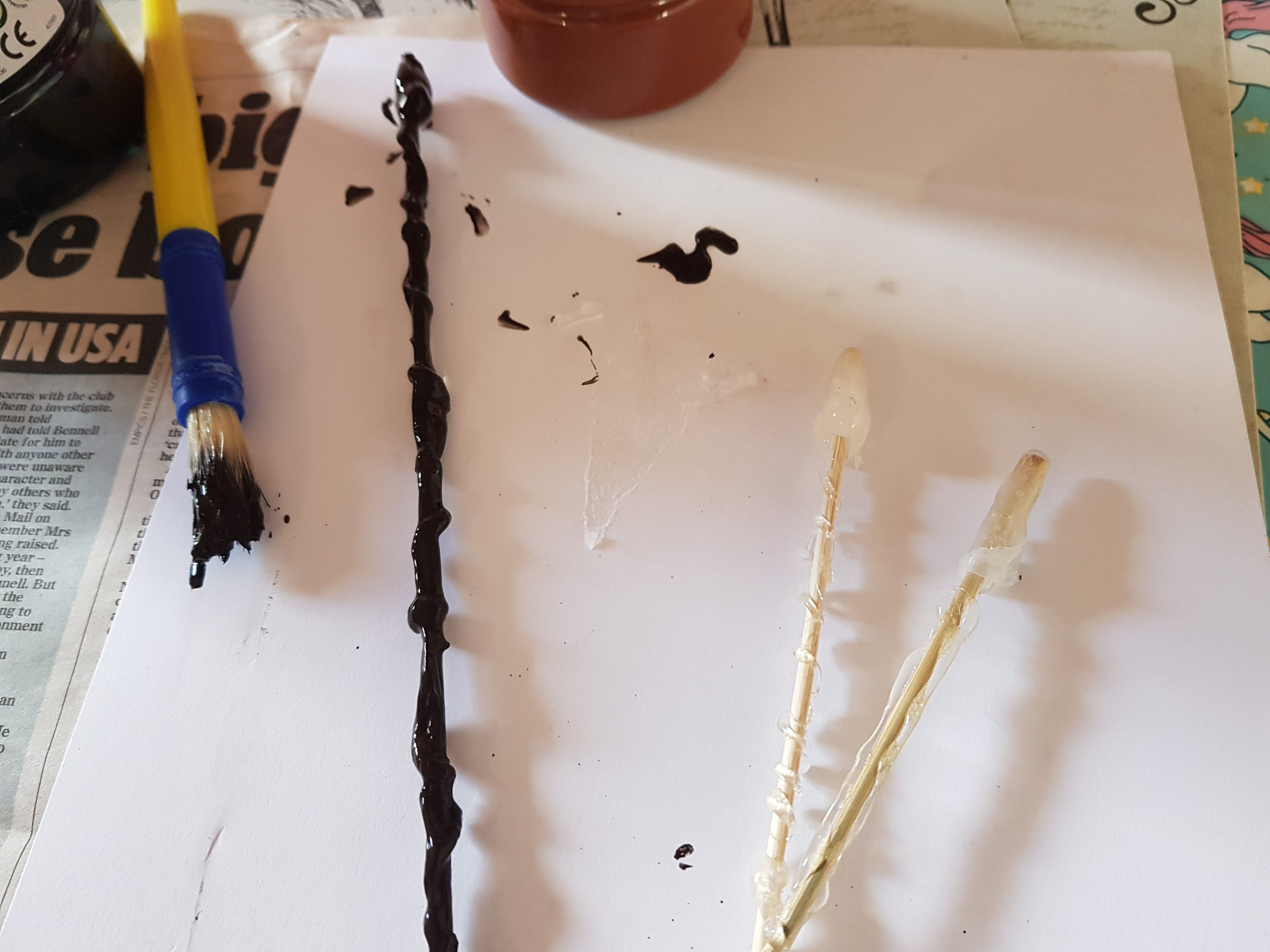 Painted and glued skewers for wizarding wands