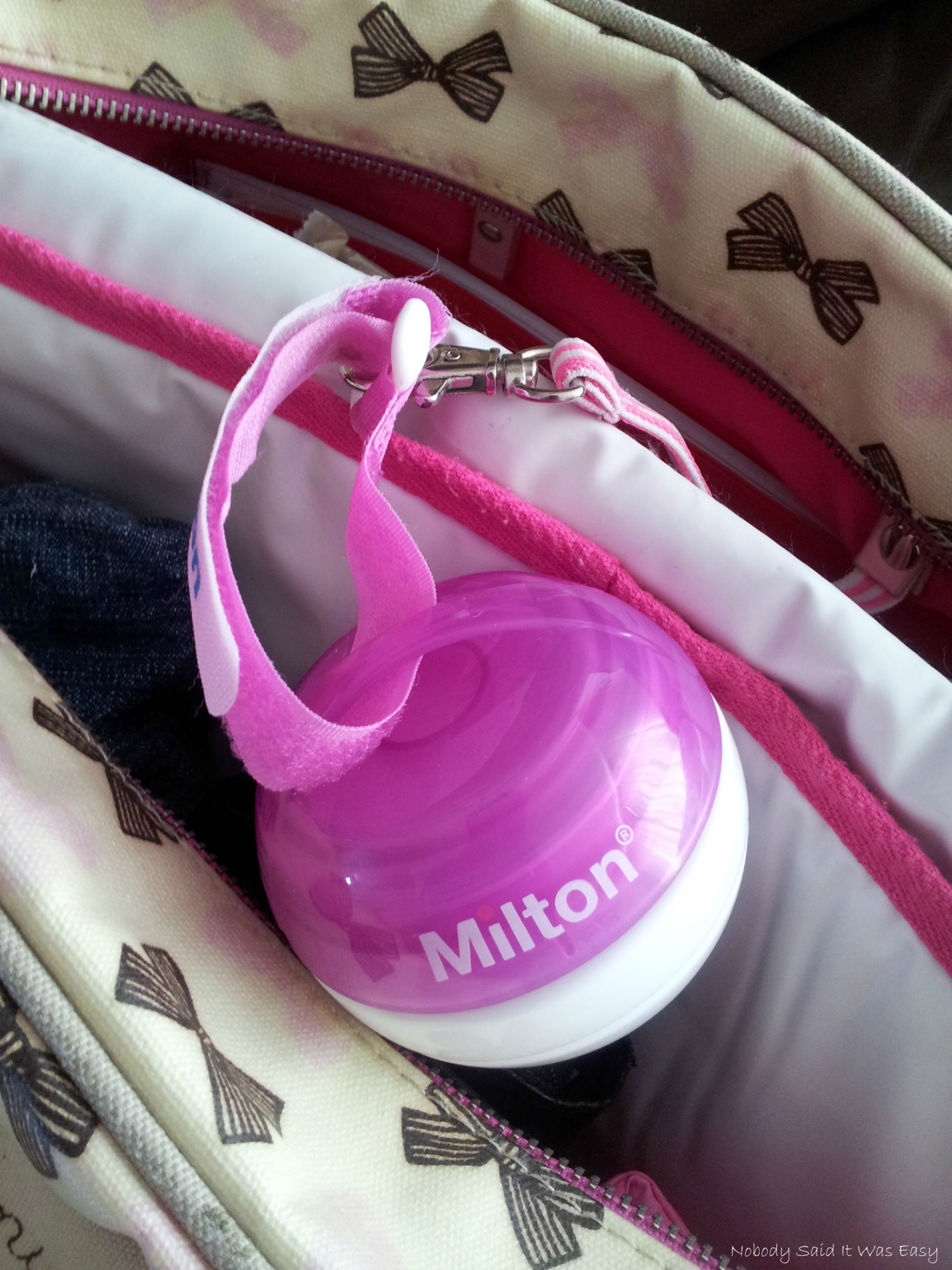 Milton mini attached to bag