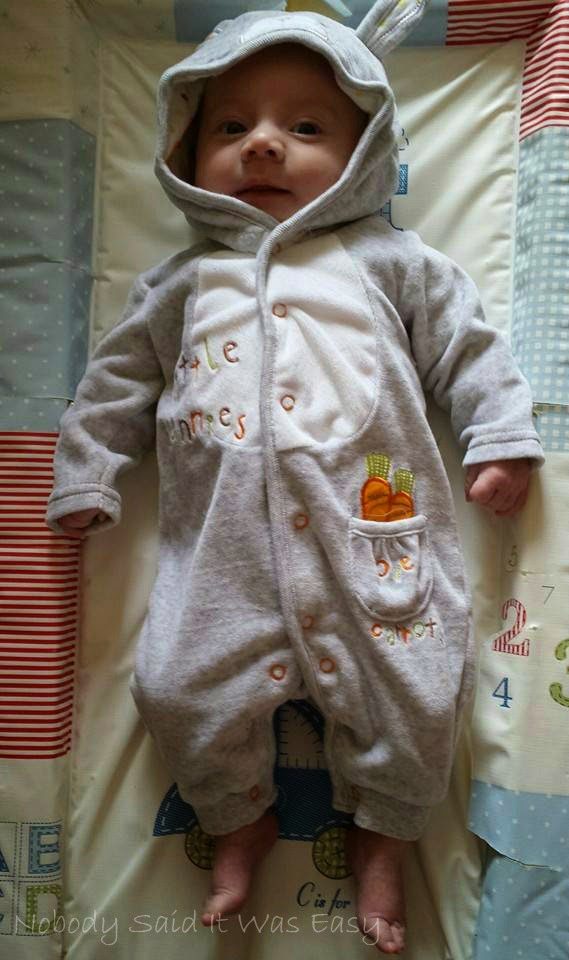 Noah in an Easter rabbit onesie