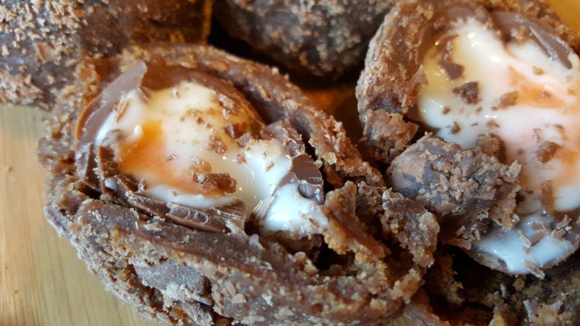 Close up of scotch brownie creme eggs cut open