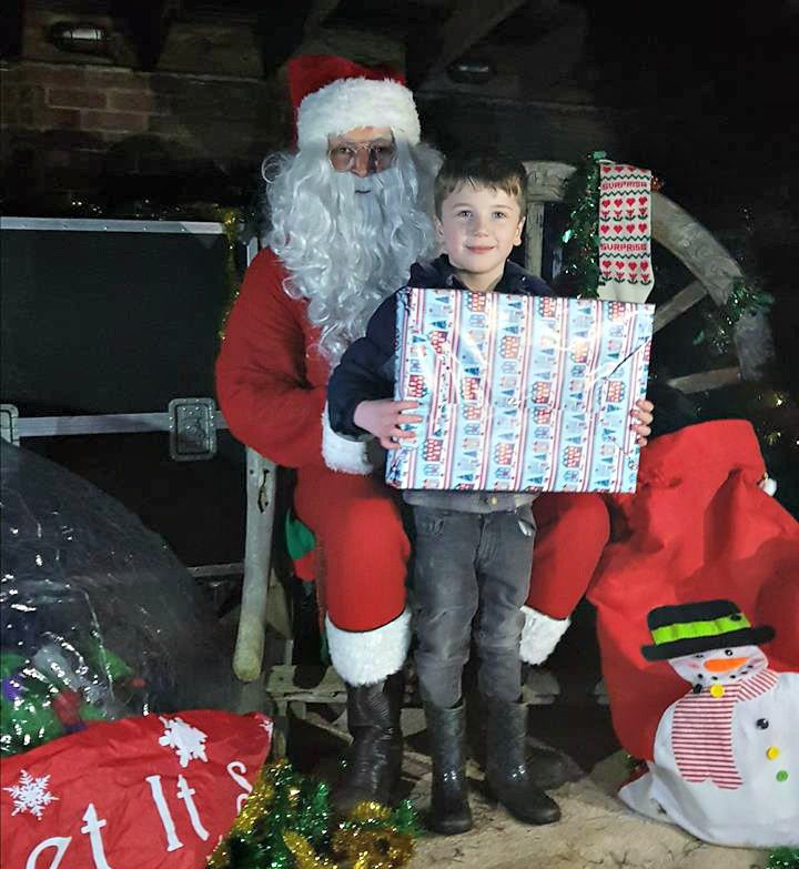 Village party - Jacob with Santa