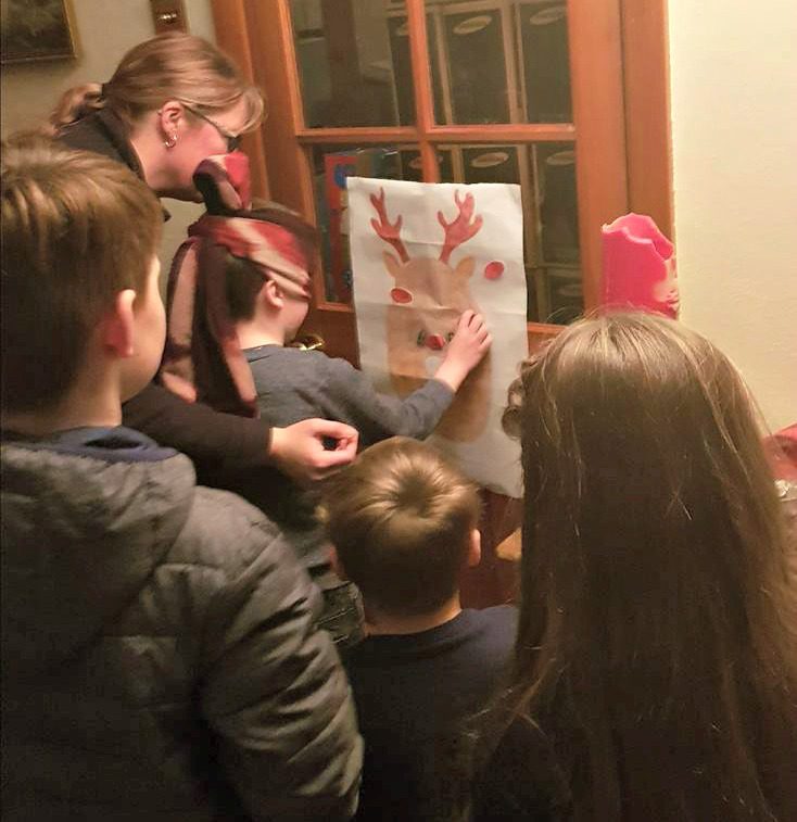 Village party games - pin the nose on rudolf