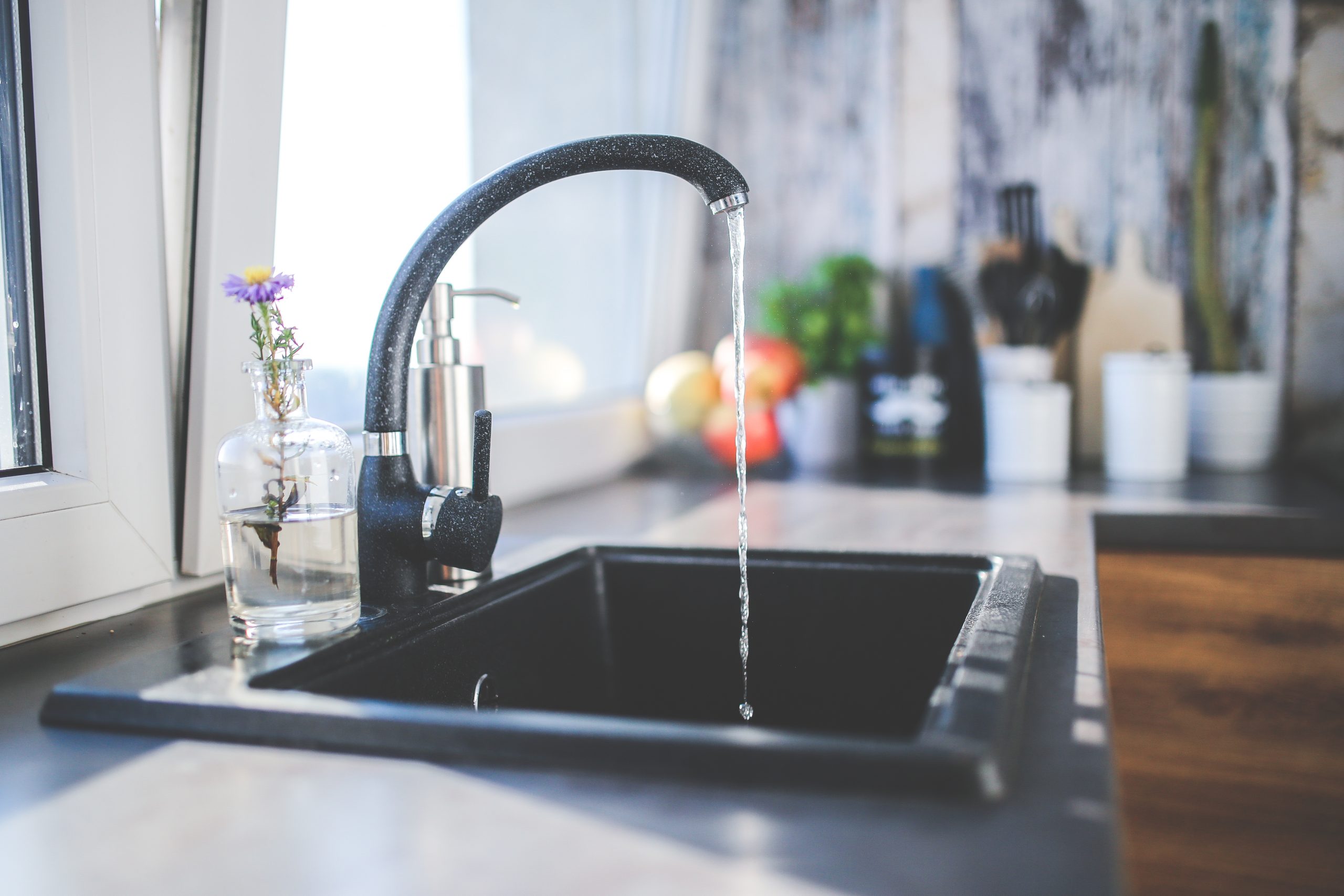 tap dripping over sink, The Easiest Ways to Save Water