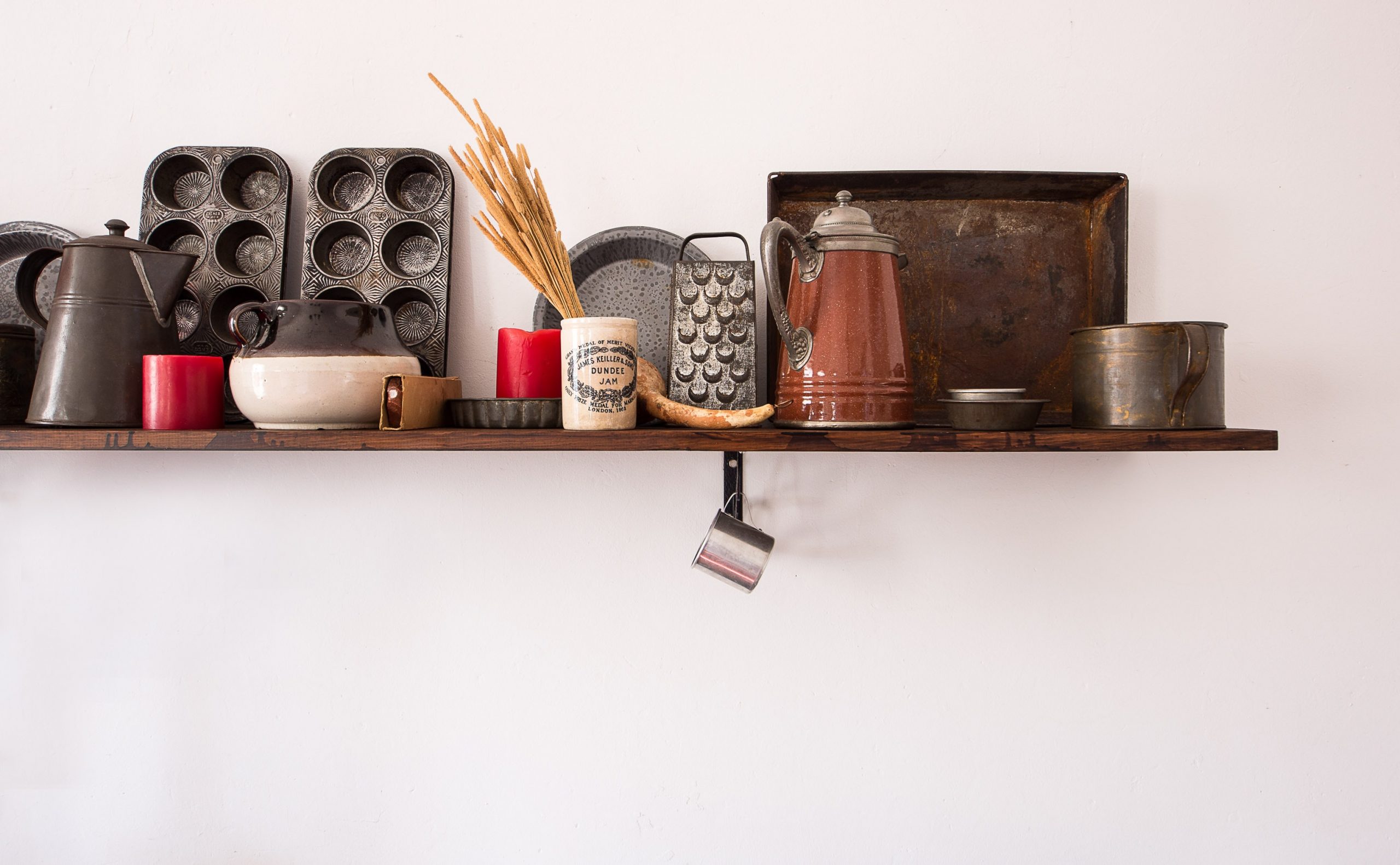 kitchen shelf packed with old farmhouse kitchen utensils, Creating Farmhouse Chic With Your Interior