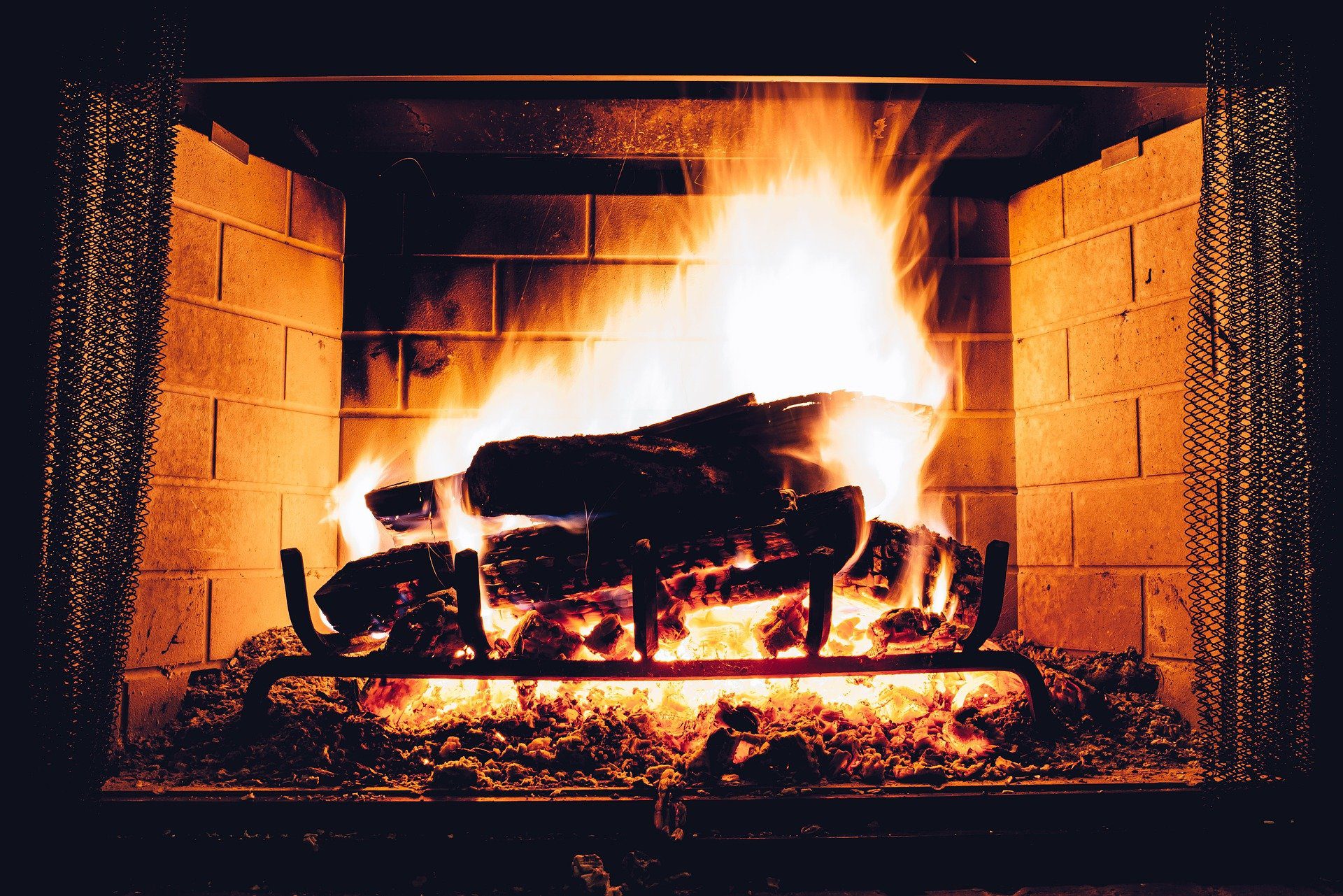 roaring fireplace, The 4 Best Ways to Keep Your Home Warm This Winter