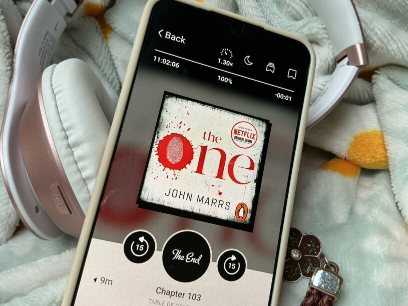 The One by John Marrs audiobook format on a cell phone screen